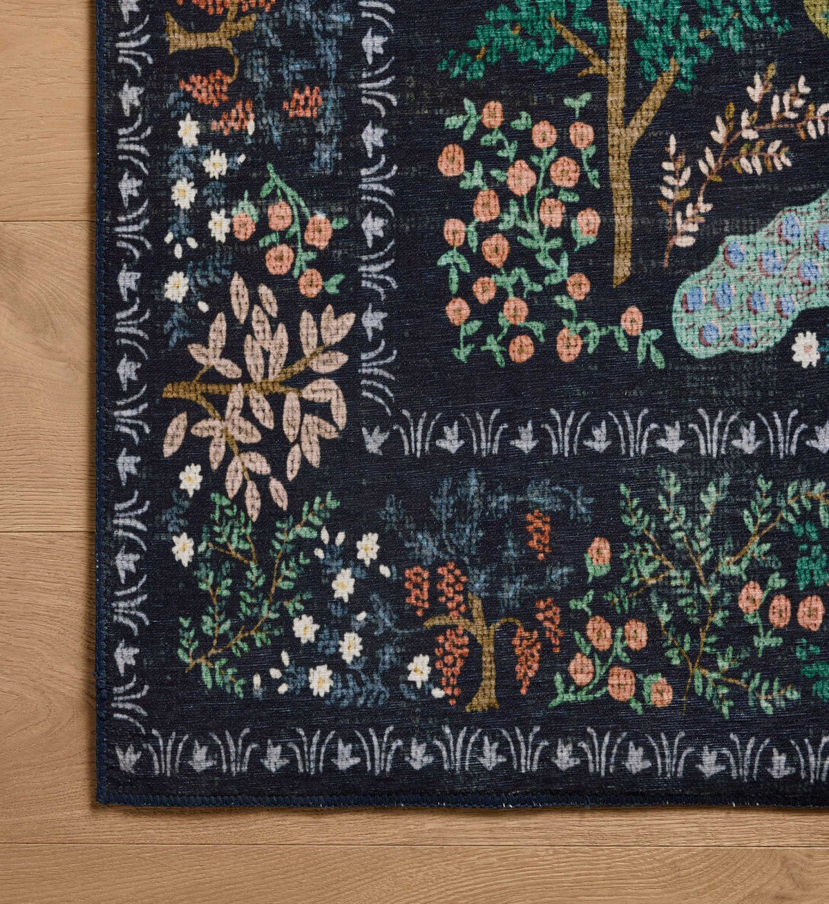 Hope Forest Rug Canopy Peacock Forest Rug in Charcoal | Rifle Paper Co.