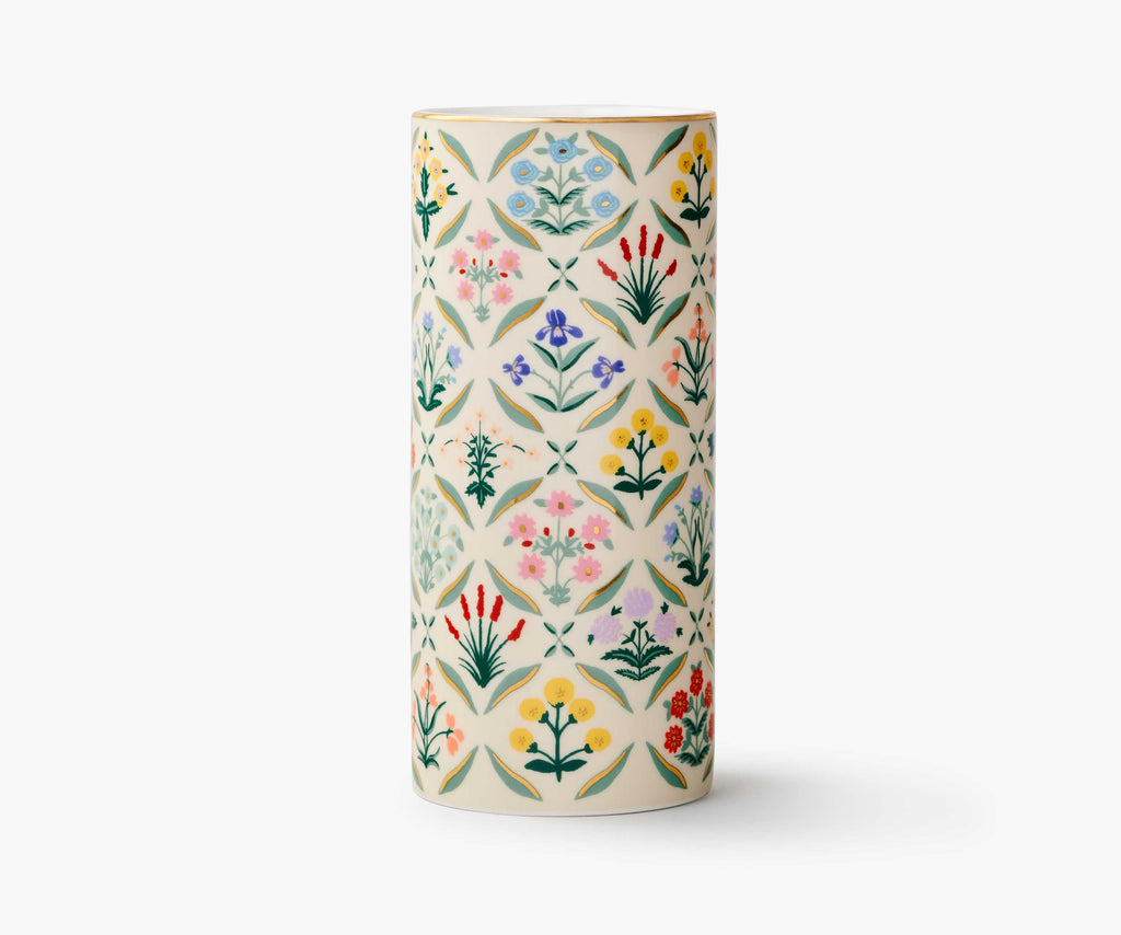 A white vase with a floral pattern