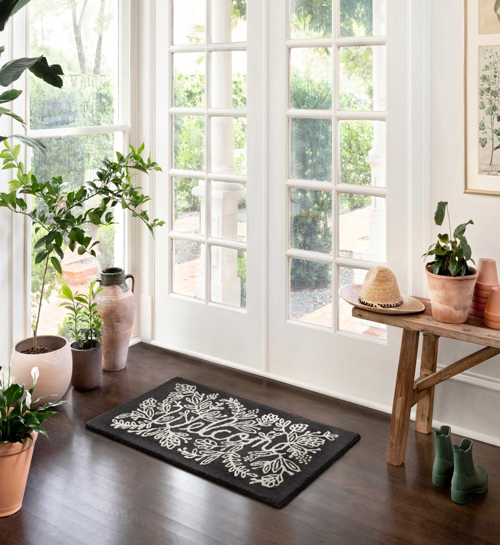 Minnie Welcome Black Wool-Hooked Rug | Rifle Paper Co.