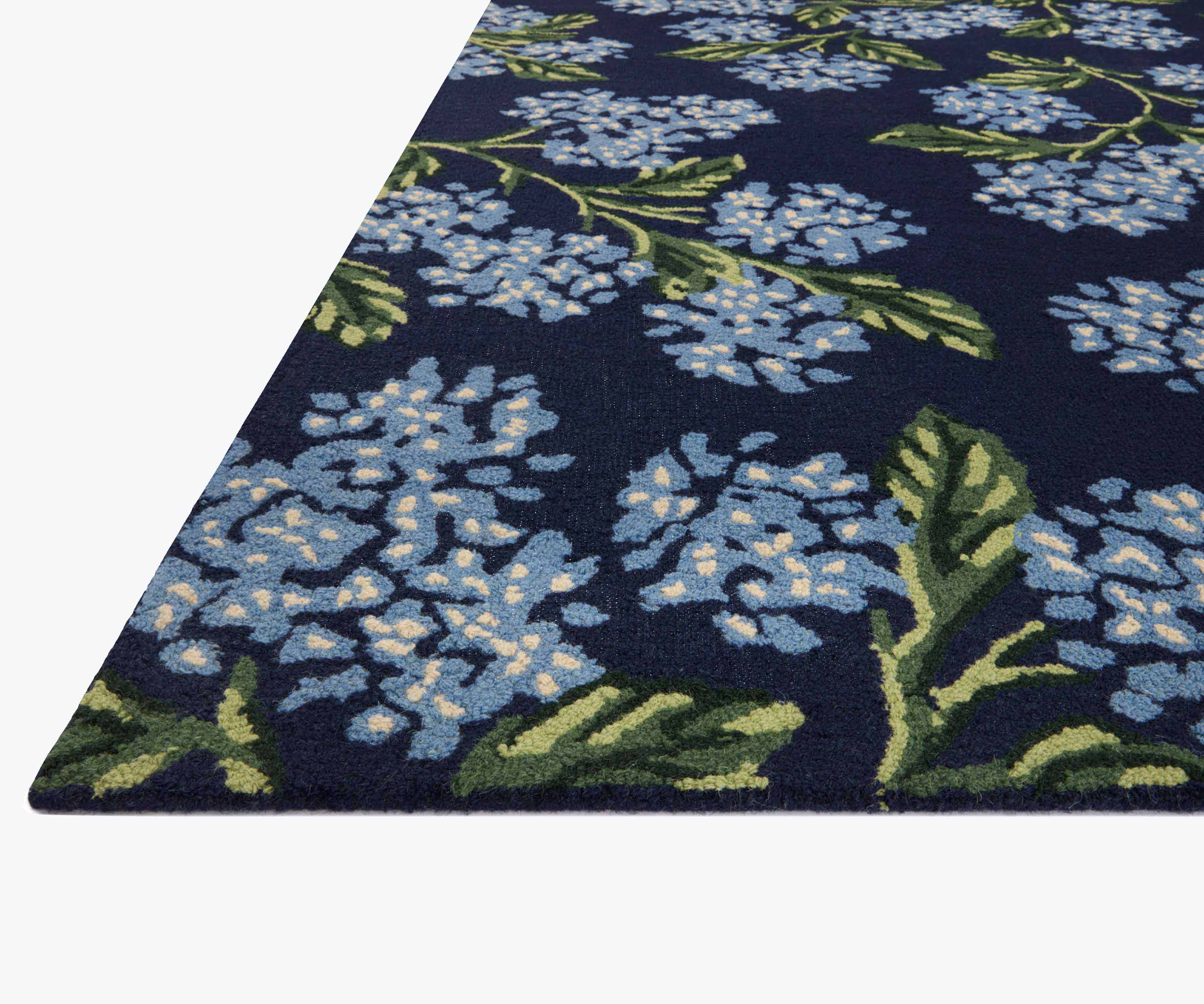 Joie Hydrangea Wool-Hooked Rug in Navy | Rifle Paper Co.